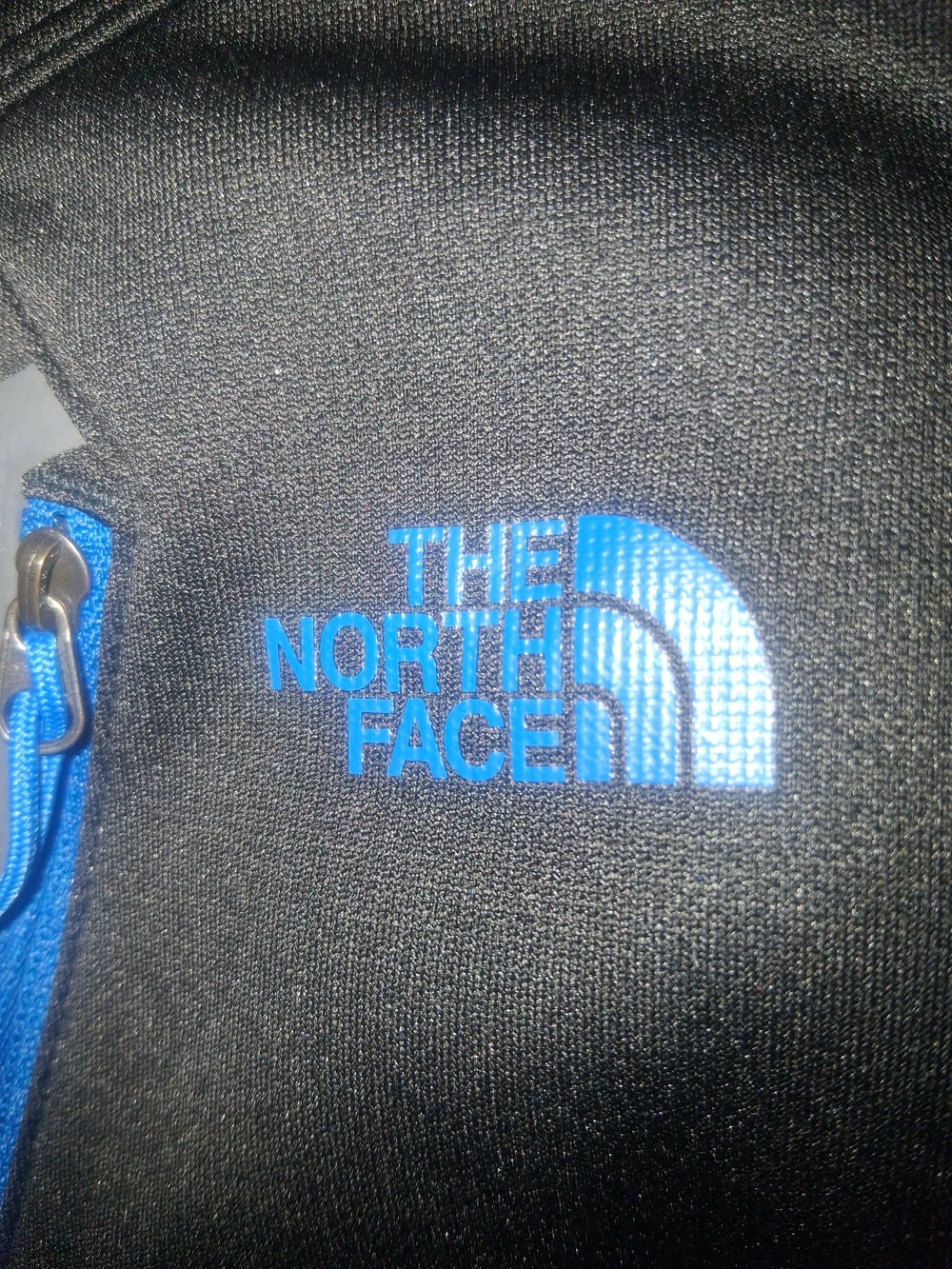 The North Face Men's Black Quarter-zip Pullover Jacket with Blue Accents